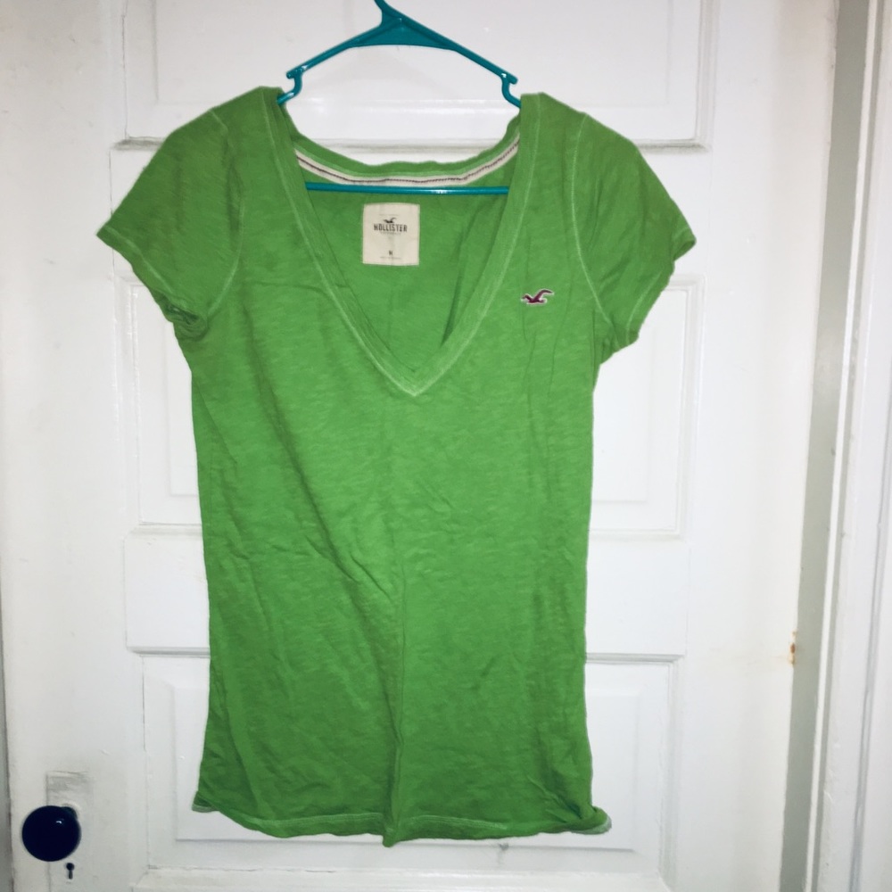 A green short sleeve v neck t-shirt